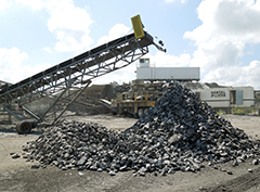 Stockpiling crushed rock at a quarry