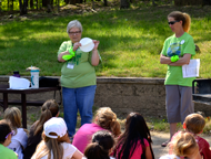 A Project Wet Coordinator conducts a session at a student outdoor event