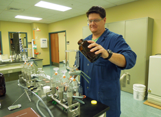 DEQ Laboratory and Monitoring Services chemist prepares sample for analysis