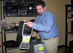 Computer Specialist moves equipment