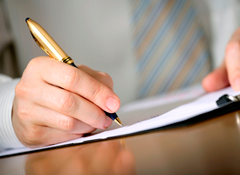 Man writing with a pen